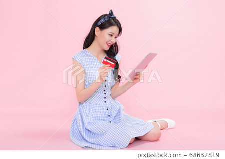 Life style concept, happy shopping time. Young asian woman with shopping bags and cart. 201 68632819