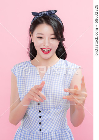 Life style concept, happy shopping time. Young asian woman with shopping bags and cart. 200 Life style concept, happy shopping time. Young asian woman with shopping bags and cart. 200 68632829