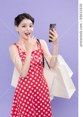 Life style concept, happy shopping time. Young asian woman with shopping bags and cart. 541 68632839