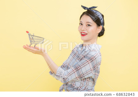 Life style concept, happy shopping time. Young asian woman with shopping bags and cart. 395 68632843