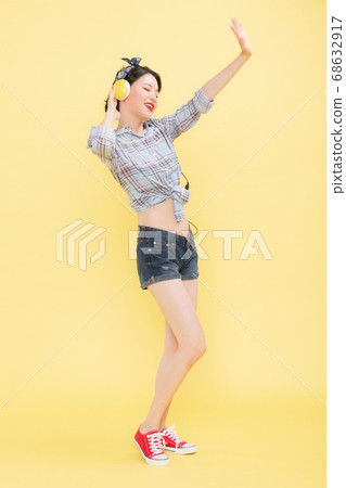 Life style concept, happy shopping time. Young asian woman with shopping bags and cart. 325 68632917