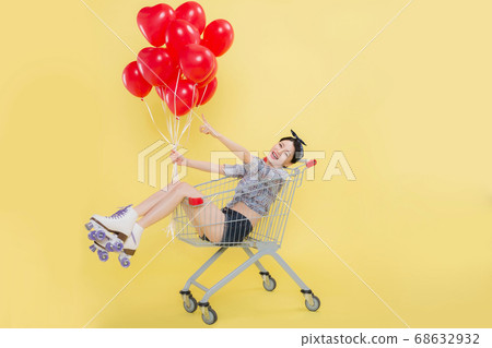 Life style concept, happy shopping time. Young asian woman with shopping bags and cart. 459 68632932
