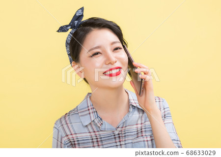 Life style concept, happy shopping time. Young asian woman with shopping bags and cart. 380 Life style concept, happy shopping time. Young asian woman with shopping bags and cart. 380 68633029