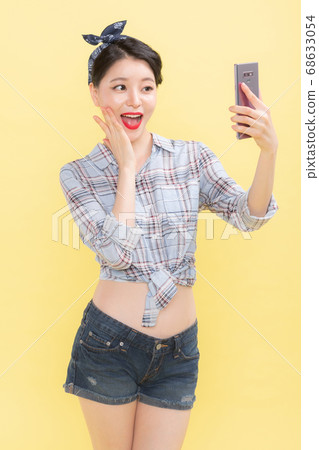 Life style concept, happy shopping time. Young asian woman with shopping bags and cart. 388 Life style concept, happy shopping time. Young asian woman with shopping bags and cart. 388 68633054