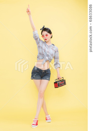 Life style concept, happy shopping time. Young asian woman with shopping bags and cart. 411 Life style concept, happy shopping time. Young asian woman with shopping bags and cart. 411 68633086