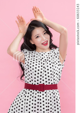 Life style concept, happy shopping time. Young asian woman with shopping bags and cart. 092 68633143