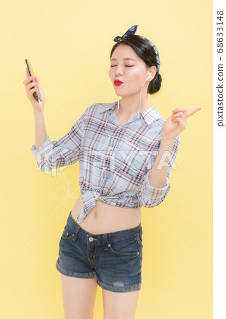 Life style concept, happy shopping time. Young asian woman with shopping bags and cart. 359 68633148