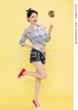 Life style concept, happy shopping time. Young asian woman with shopping bags and cart. 284 68633187