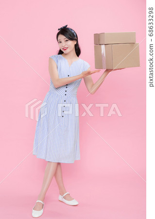 Life style concept, happy shopping time. Young asian woman with shopping bags and cart. 211 Life style concept, happy shopping time. Young asian woman with shopping bags and cart. 211 68633298