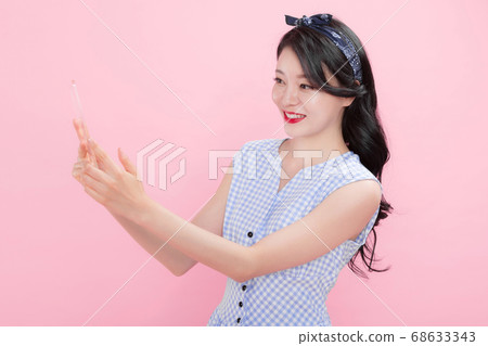 Life style concept, happy shopping time. Young asian woman with shopping bags and cart. 196 68633343