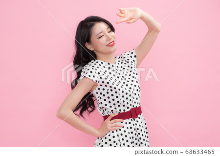 Life style concept, happy shopping time. Young asian woman with shopping bags and cart. 026 68633465