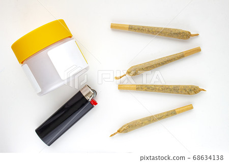 A Cannabis white and yellow plastic packaging A Cannabis white and yellow plastic packaging 68634138