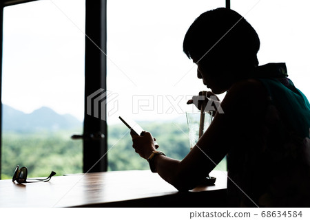 woman sit and get a cold drinks 68634584