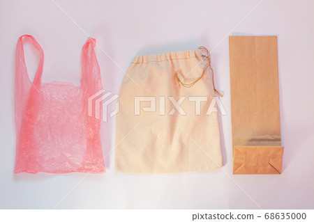 Plastic bag vs paper pack vs fabric eco bag. Say Plastic bag vs paper pack vs fabric eco bag. Say 68635000