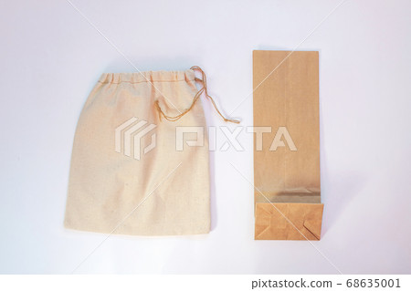 Plastic bag vs paper pack vs fabric eco bag. Say Plastic bag vs paper pack vs fabric eco bag. Say 68635001
