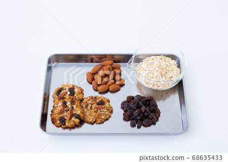 Oatmeal cookies and ingredients Oatmeal cookies and ingredients 68635433