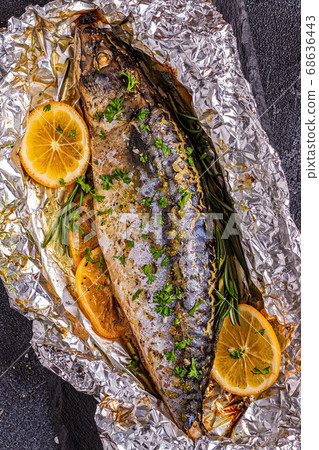 Mackerel baked in foil with spices 68636443