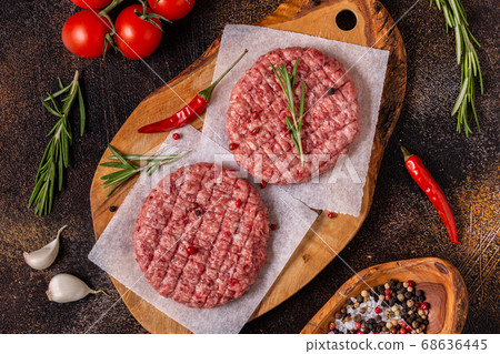 Fresh raw minced homemade grill beef burgers Fresh raw minced homemade grill beef burgers 68636445