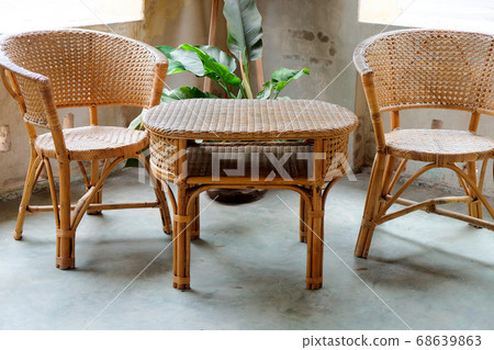 Image of Interior decorative for living area with rattan armchair and plants Image of Interior decorative for living area with rattan armchair and plants 68639863