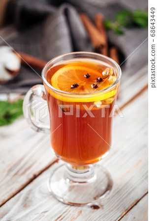 Moroccan tea with lemon and spices in a glass mug Moroccan tea with lemon and spices in a glass mug 68643449