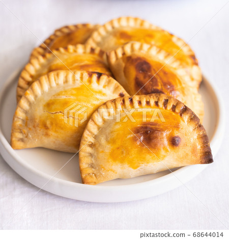 Empanadillas popular snack in Spain 68644014