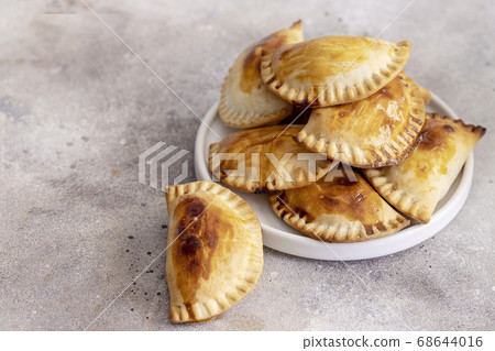 Empanadillas popular snack in Spain 68644016