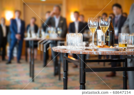 Party where people in suits gather 68647154