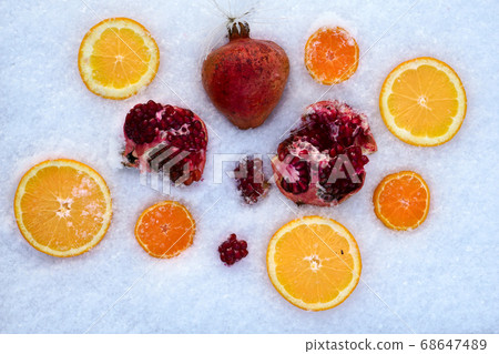 Fresh mixed fruit on snow Fresh mixed fruit on snow 68647489