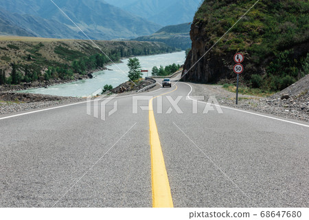 Chuysky trakt road in the Altai mountains. Chuysky trakt road in the Altai mountains. 68647680