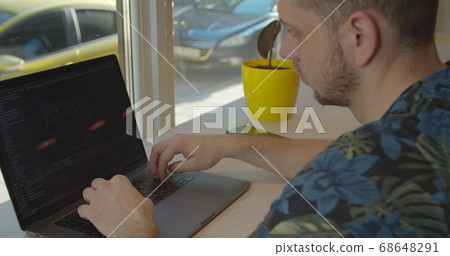 Close up Man coding html and programming on screen Monitors, development web, developer. 68648291