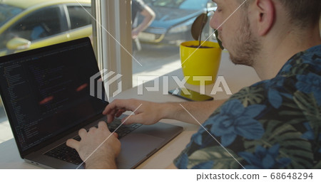 Close up Man coding html and programming on screen Monitors, development web, developer. 68648294