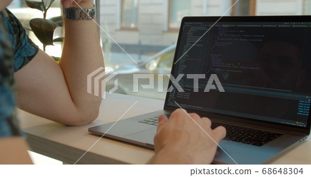 Close up Man coding html and programming on screen Monitors, development web, developer. 68648304