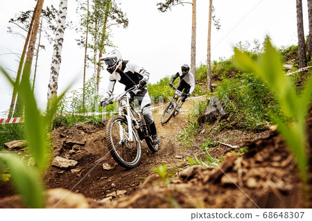 two downhill mountain biker two downhill mountain biker 68648307