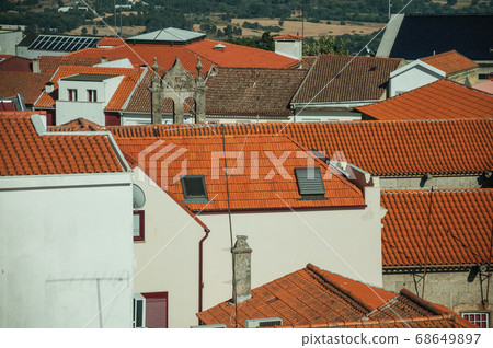 Urban landscape with rooftops of old whitewashed houses 68649897