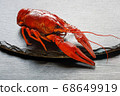 Boiled red crayfish on a platter close up 68649919