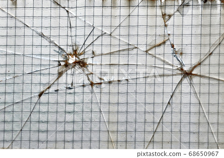 smashed wire glass squares background 68650967
