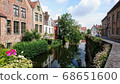 Bruges, the City of Water: A lovely cityscape reflected on the surface of the water 68651600