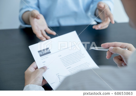Business office executives are interviewing job applicants in the meeting room Business office executives are interviewing job applicants in the meeting room 68653863