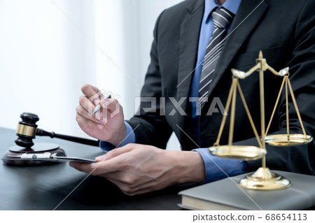 Picture of the male lawyer is providing service to consult business dispute 68654113