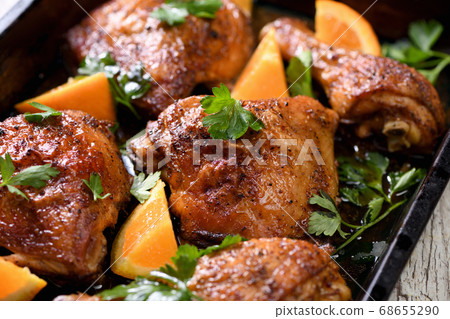Fried chicken with oranges Fried chicken with oranges 68655290