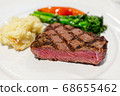 Delicious medium rare sirloin beef steak  68655462