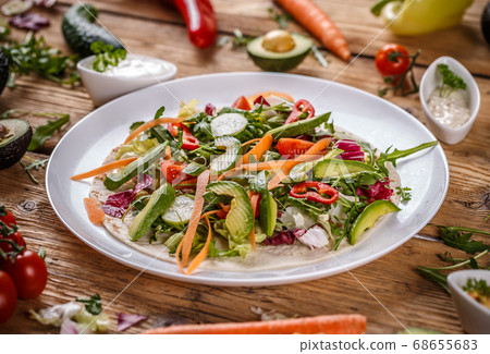 Healthy vegetarian salad tortilla wraps Healthy vegetarian salad tortilla wraps 68655683