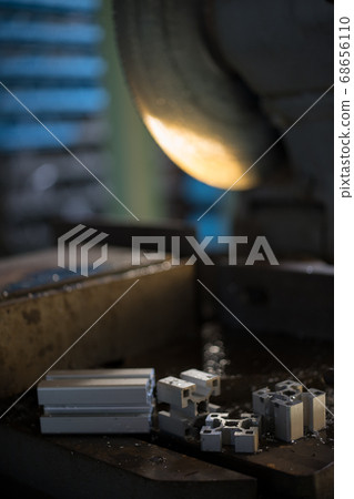 Cutting of aluminum frame with metal saw Cutting of aluminum frame with metal saw 68656110