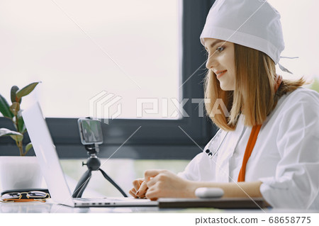 Woman doctor recording vlog video about medicin 68658775