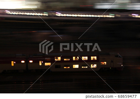 Sleeper express trains Sunrise Seto and Izumo and the Tokaido Shinkansen departing Tokyo Station at night Sleeper express trains Sunrise Seto and Izumo and the Tokaido Shinkansen departing Tokyo Station at night 68659477