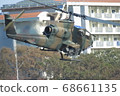 Cobra, an attack helicopter flying low 68661135