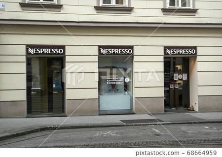 Nespresso  brand shop window in Graz 68664959