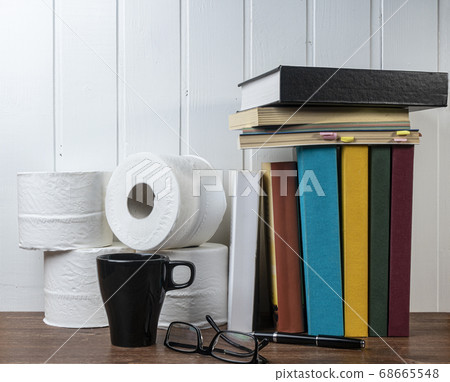 Toilet paper rolls and books Toilet paper rolls and books 68665548