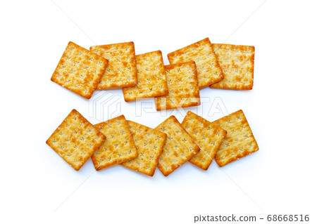 Crackers with sugar on white background. Crackers with sugar on white background. 68668516