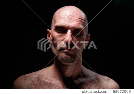 Photo of adult man with nude shoulders Photo of adult man with nude shoulders 68672969